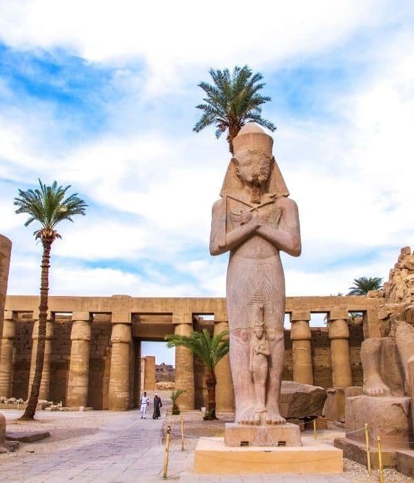 Colossal statue of a pharaoh at Karnak Temple, Luxor, Egypt