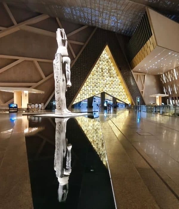 Grand Egyptian Museum tour Cairo with Egypt Unlocked guide at GEM entrance