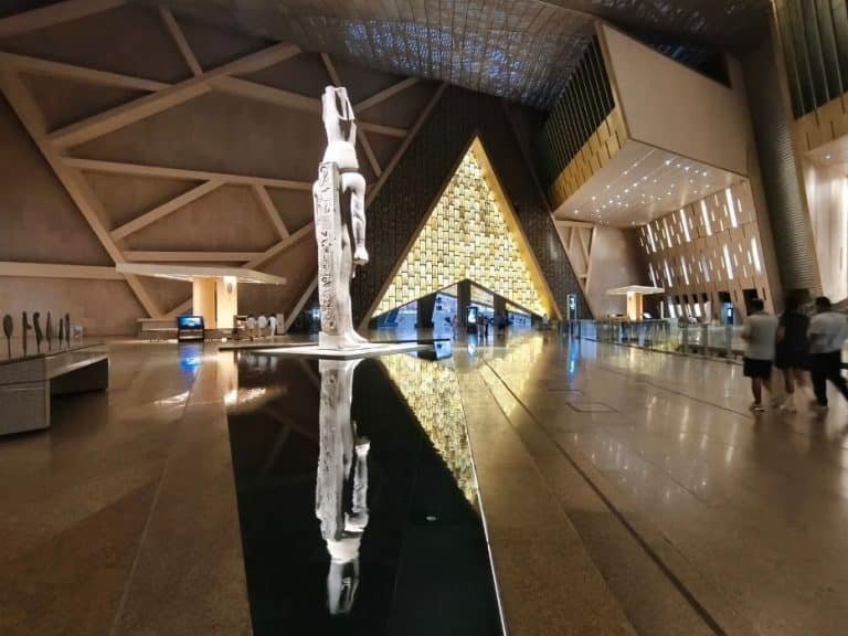 Grand Egyptian Museum tour Cairo with Egypt Unlocked guide at GEM entrance