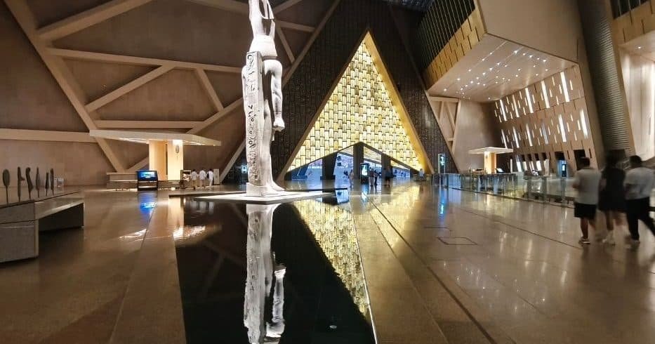 Grand Egyptian Museum tour Cairo with Egypt Unlocked guide at GEM entrance