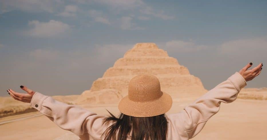 A girl standing in front of Saqqara pyramid