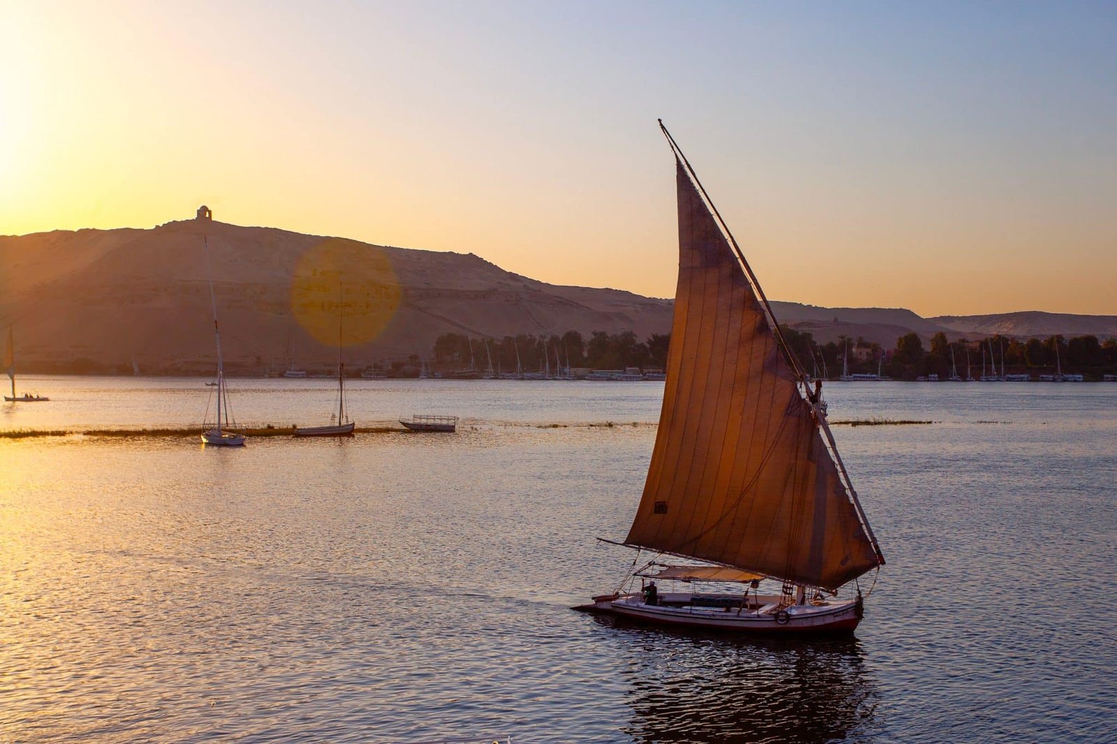 Sailing,Boat,On,The,Nile,River,At,Sunset,Time,,Aswan,
